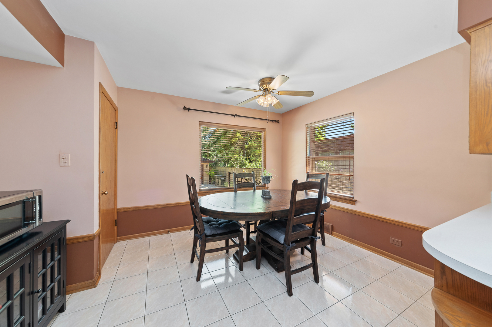 399 Selborne Road Riverside, IL 60546 - Photo 22 of 23 a view of a dining room with furniture and window