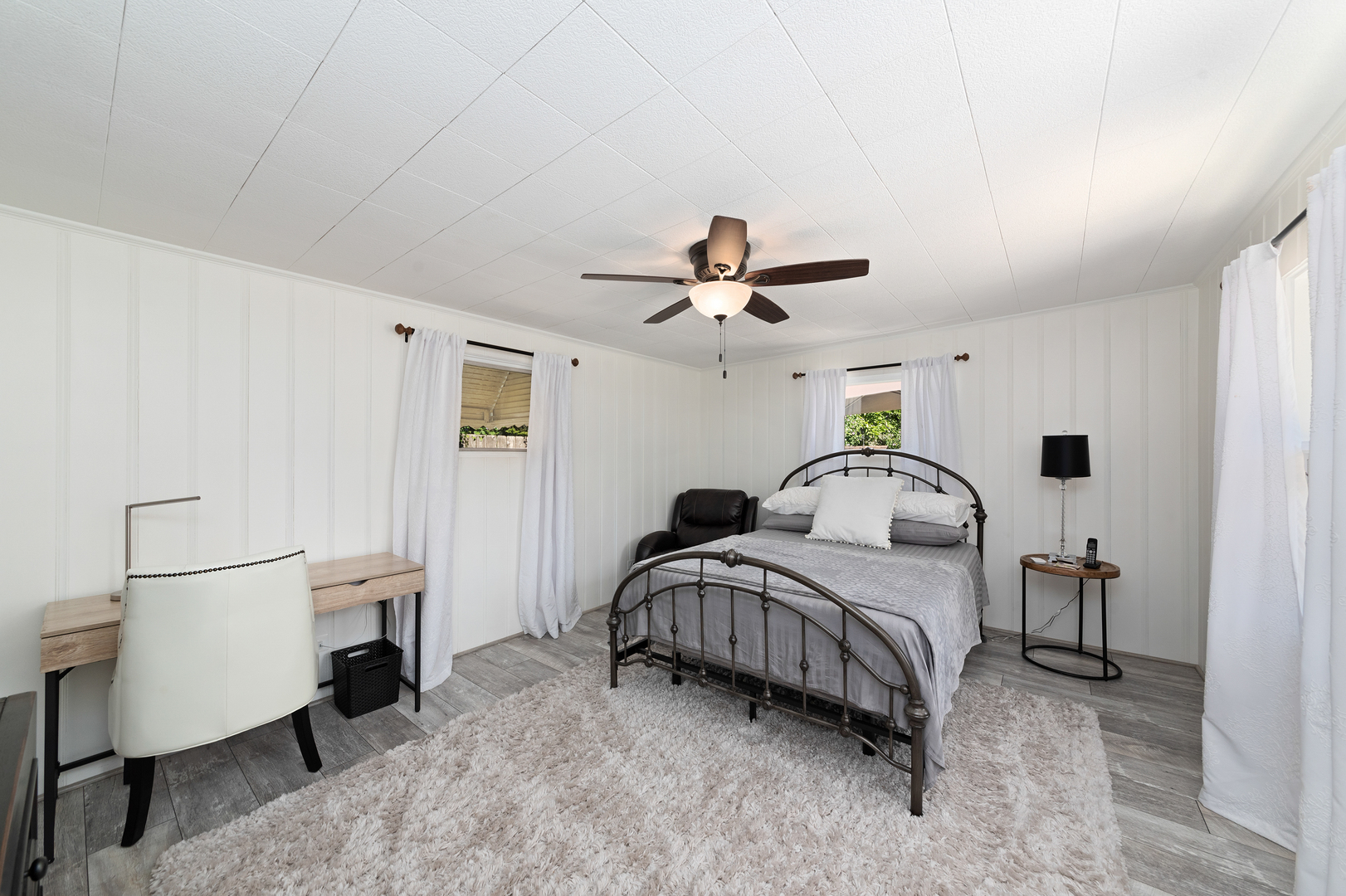 399 Selborne Road Riverside, IL 60546 - Photo 8 of 23 a bedroom with a bed and a chandelier