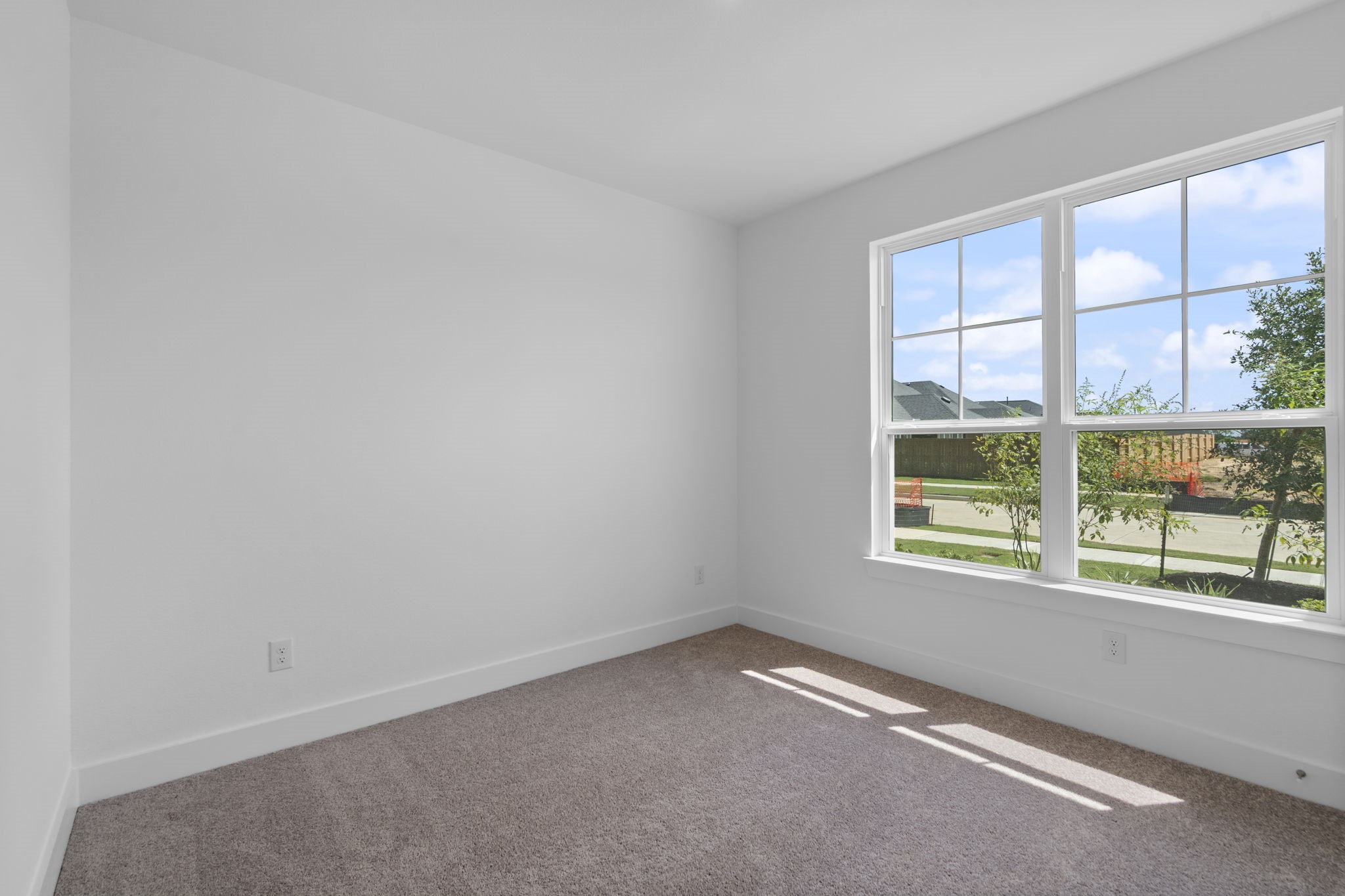 225 Sandhill Grv Trail Hempstead, TX 77445 - Photo 13 of 28 an empty room with a window