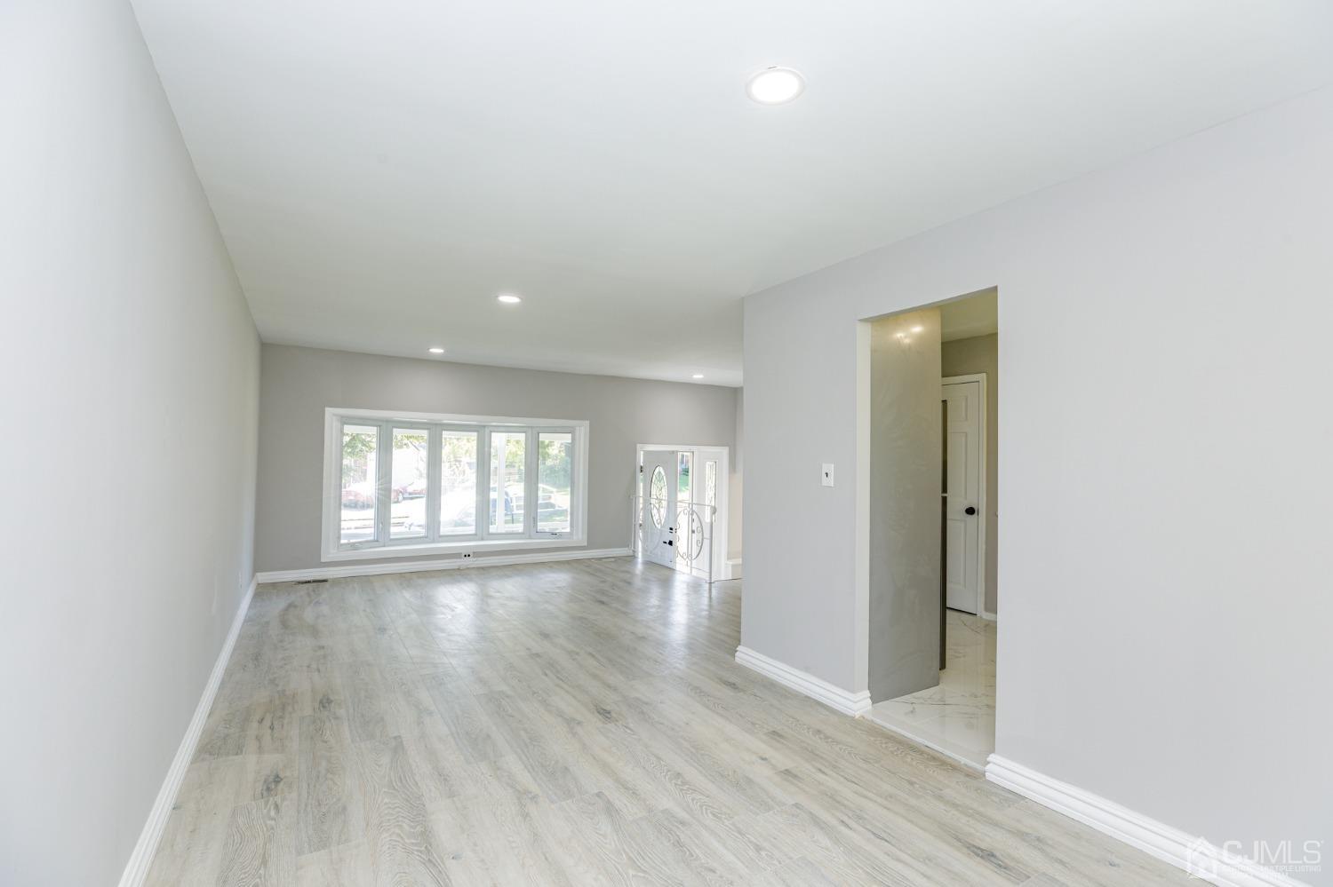 11 Larkin Road Burlington, NJ 08016 - Photo 8 of 48 wooden floor in an empty room with a window