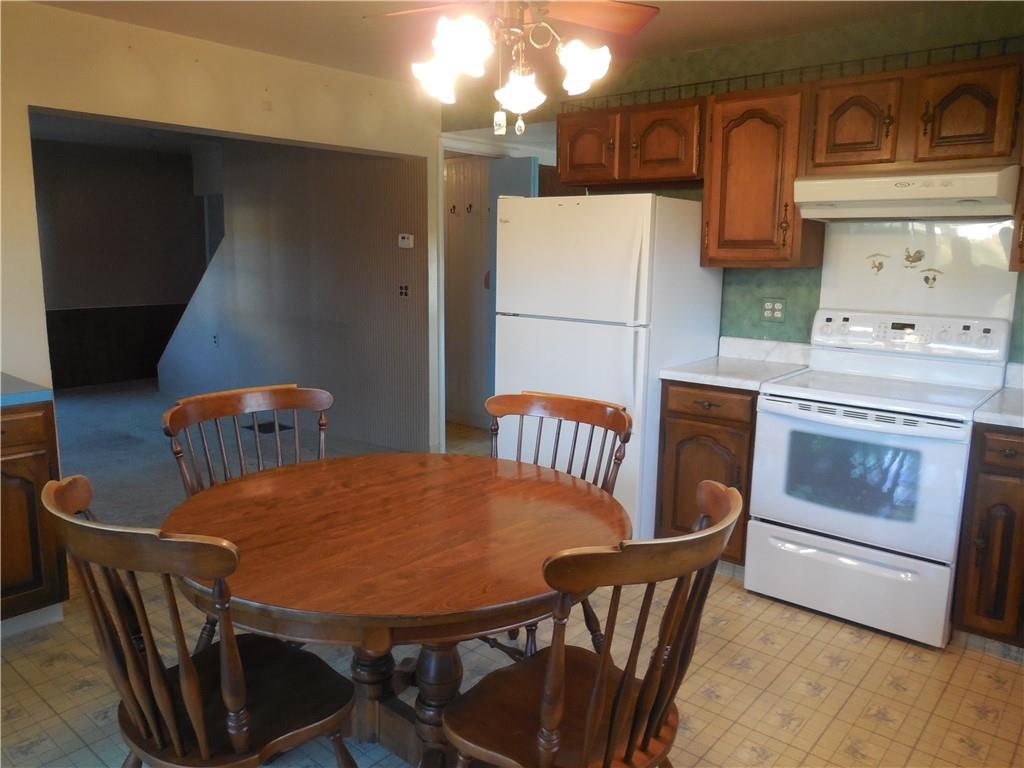 316 Highland Road Rochester, PA 15074 - Photo 11 of 31 a view of a dining room with furniture and wooden floor