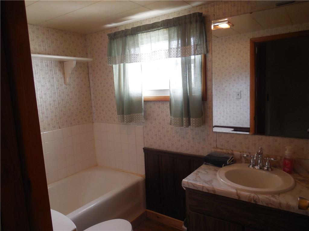 316 Highland Road Rochester, PA 15074 - Photo 19 of 31 a bathroom with a sink a toilet and shower