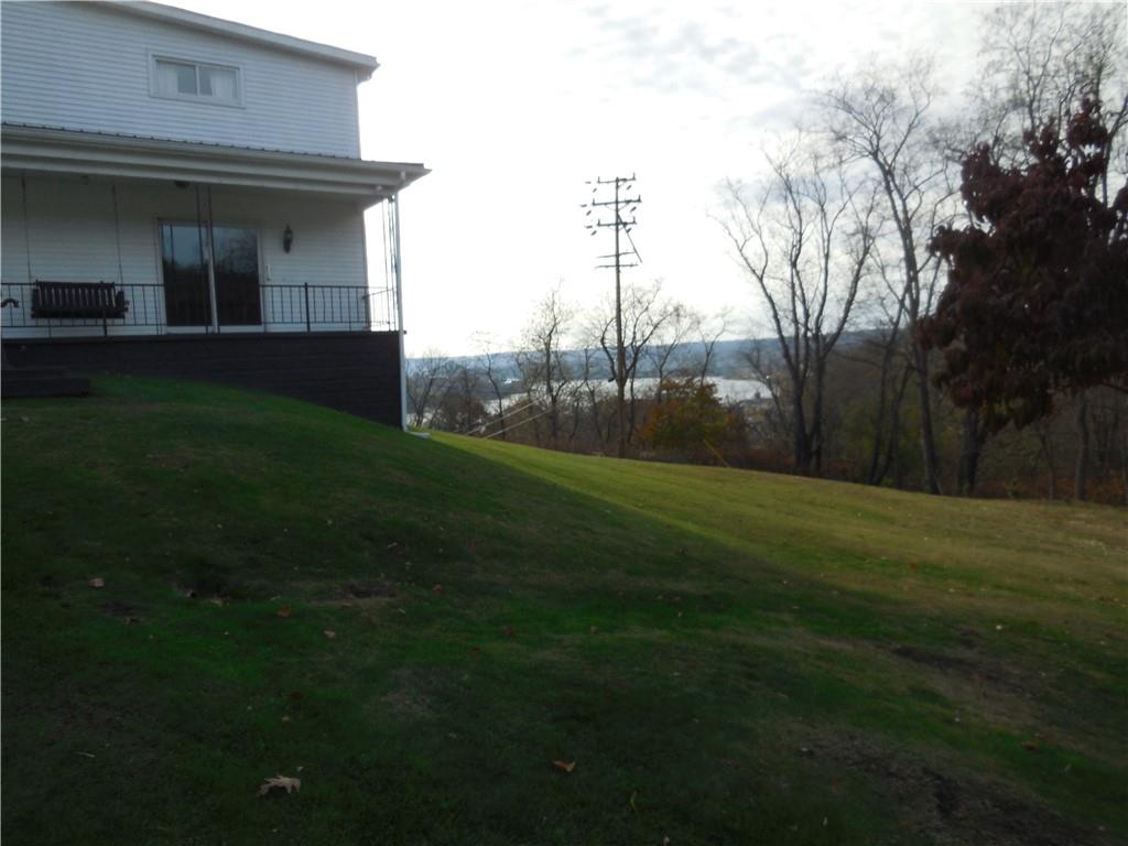 316 Highland Road Rochester, PA 15074 - Photo 4 of 31 a view of a house with a yard