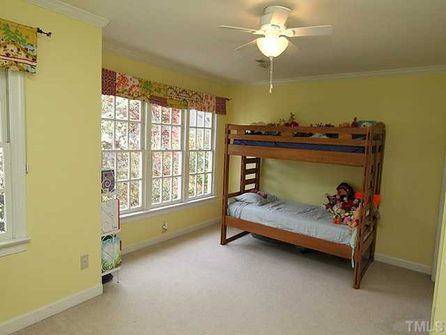 5101 Talton Circle Raleigh, NC 27612 - Photo 17 of 25 Huge second floor bedroom with crown molding and numerous windows. Bedroom