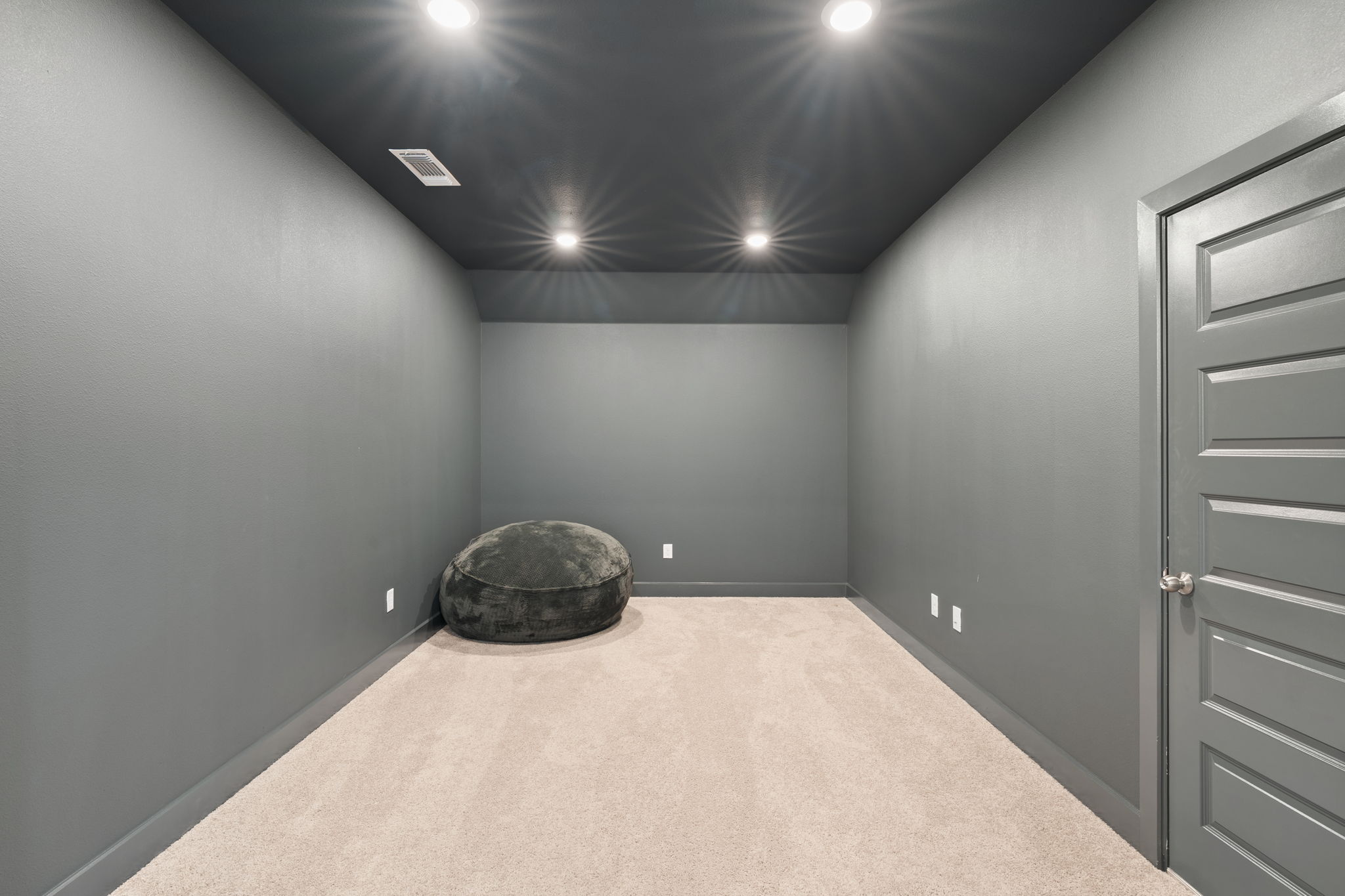 515 Watershield Cove Georgetown, TX 78633 - Photo 26 of 40 Recessed lighting illuminates this versatile bonus room, perfect for a dedicated media space or quiet retreat.