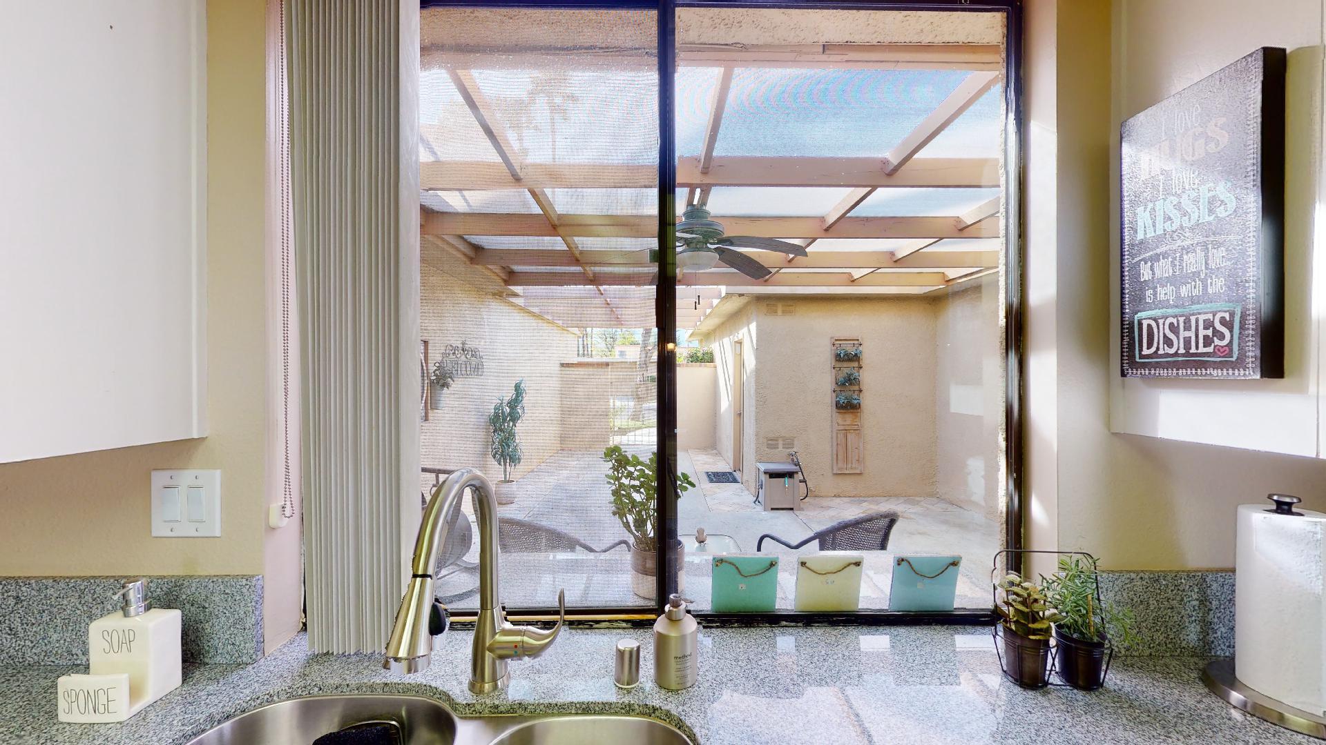 24 Granada Drive Rancho Mirage, CA 92270 - Photo 14 of 36 a living room with furniture and a window