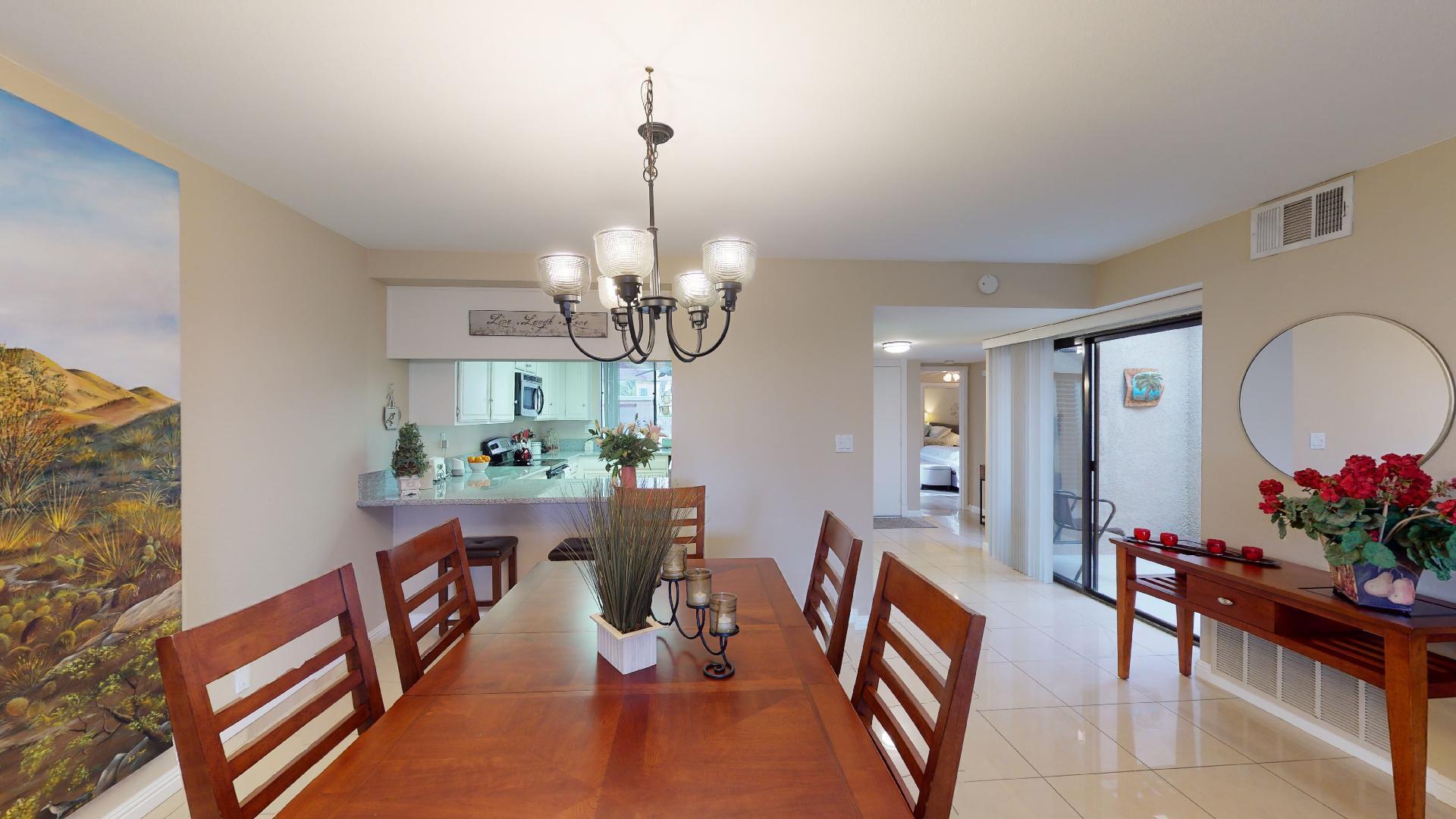 24 Granada Drive Rancho Mirage, CA 92270 - Photo 18 of 36 a view of a dining room with furniture