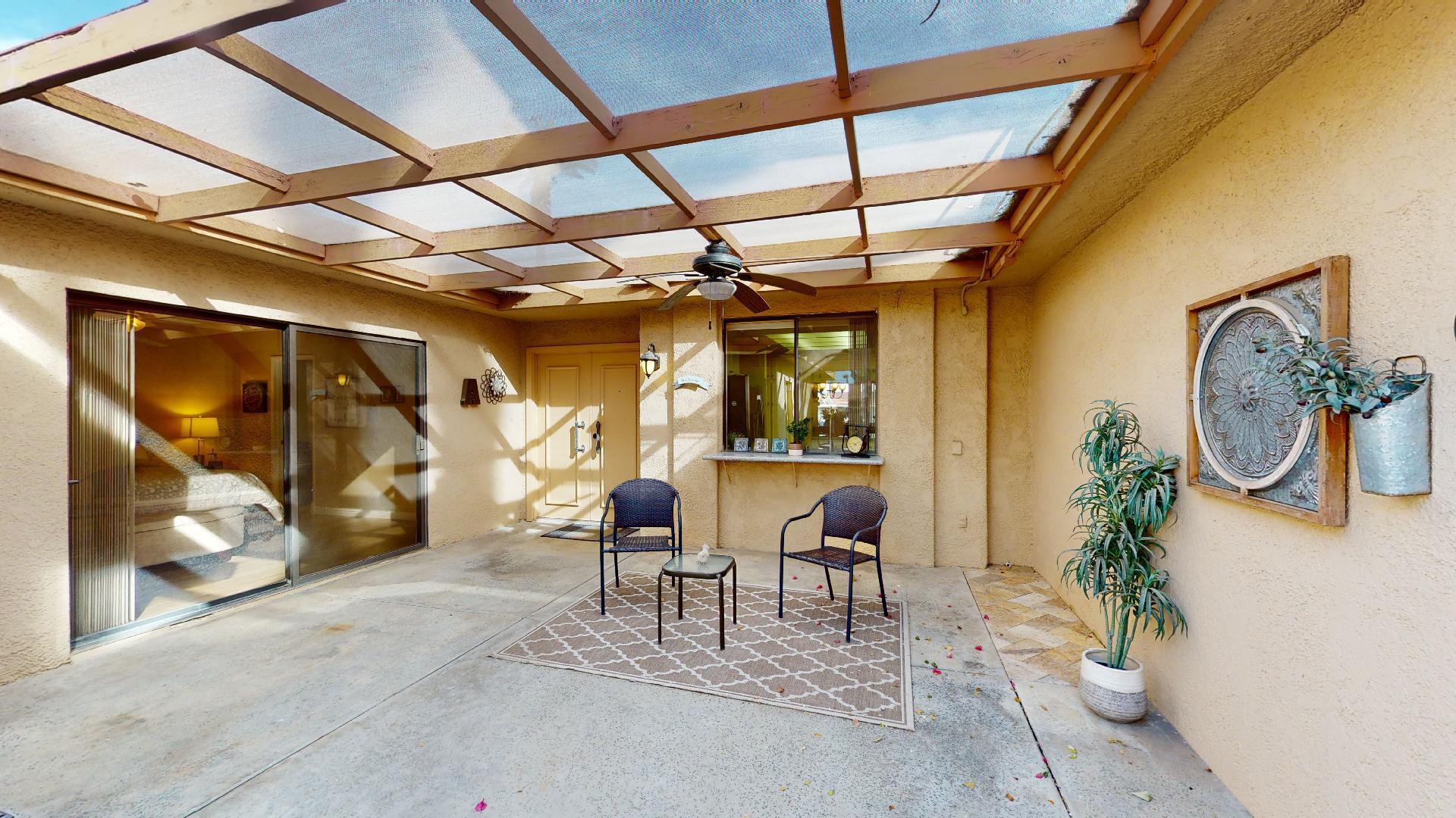 24 Granada Drive Rancho Mirage, CA 92270 - Photo 2 of 36 a view of patio with table and chairs
