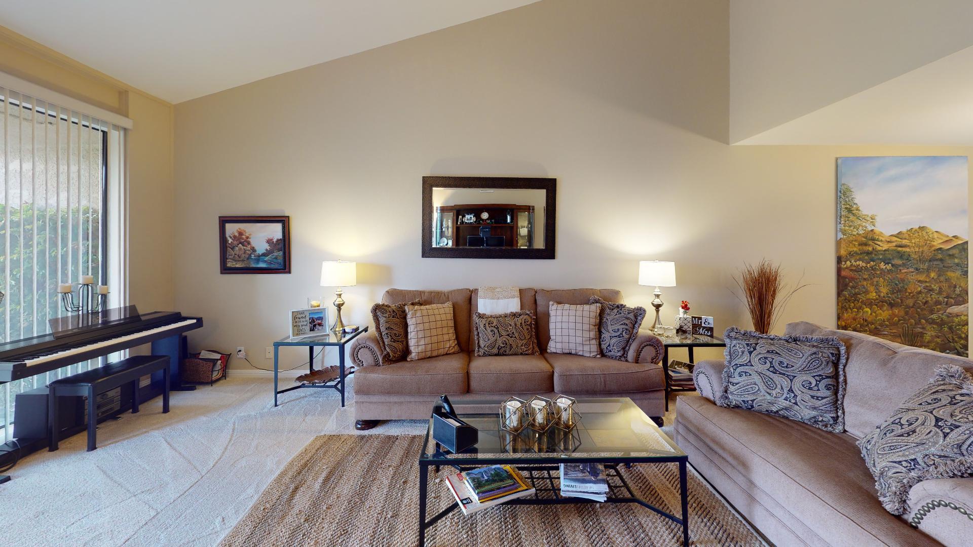 24 Granada Drive Rancho Mirage, CA 92270 - Photo 22 of 36 a living room with furniture and a flat screen tv