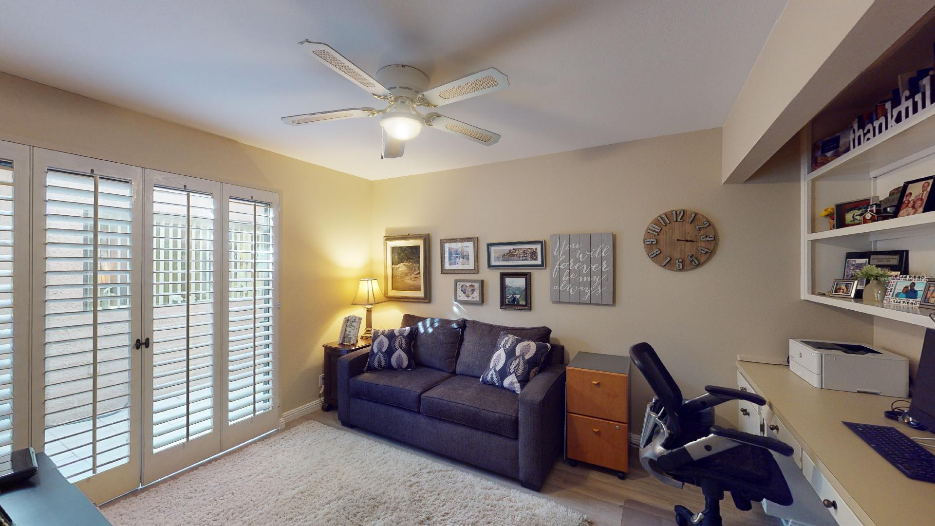 24 Granada Drive Rancho Mirage, CA 92270 - Photo 25 of 36 a living room with furniture and a window