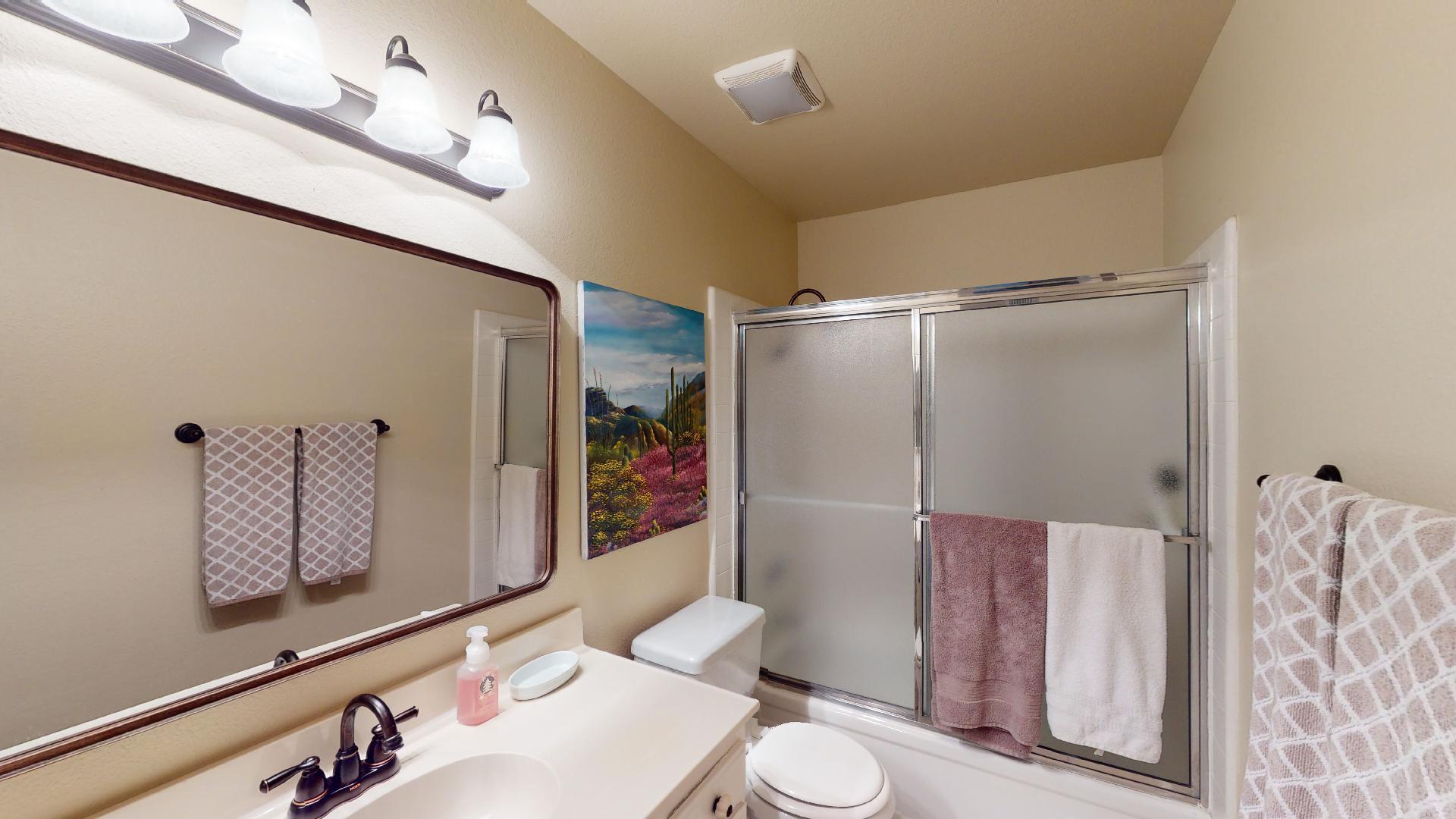 24 Granada Drive Rancho Mirage, CA 92270 - Photo 28 of 36 a bathroom with a shower sink mirror and toilet