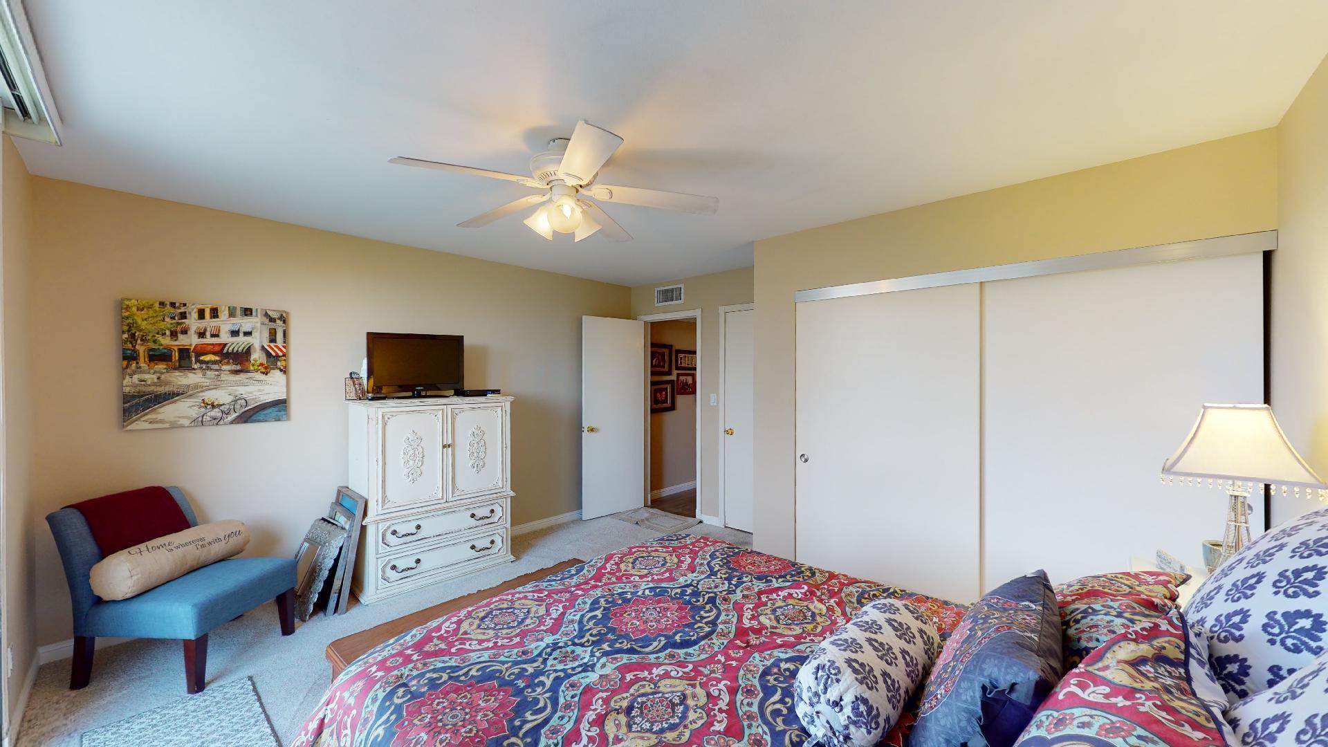 24 Granada Drive Rancho Mirage, CA 92270 - Photo 30 of 36 a bedroom with a bed and a lamp