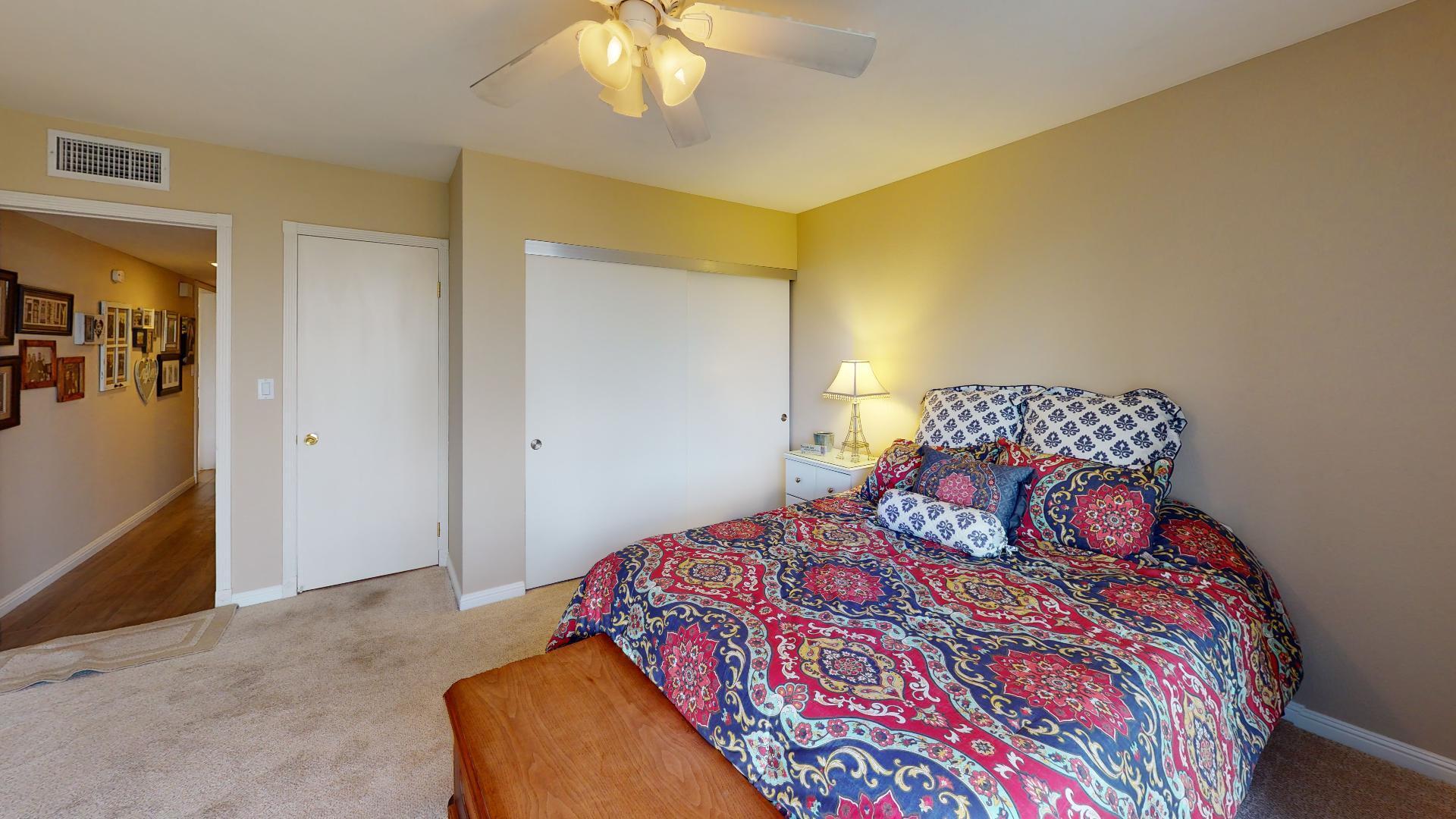 24 Granada Drive Rancho Mirage, CA 92270 - Photo 31 of 36 a bedroom with a bed and cabinets