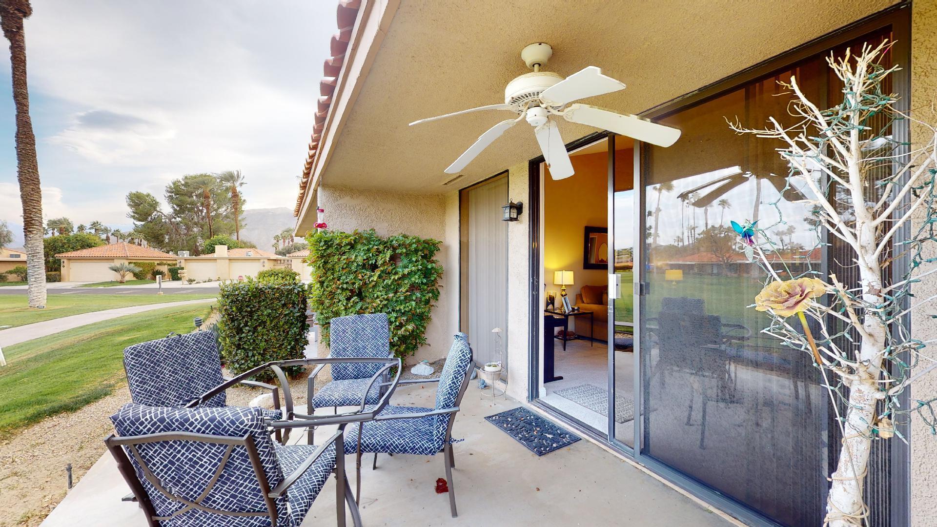 24 Granada Drive Rancho Mirage, CA 92270 - Photo 32 of 36 a view of a porch with furniture and a yard