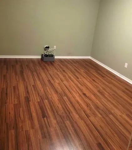 a bathroom with a double vanity sink toilet and shower