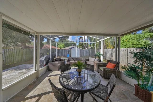 a living room with a couch and a flat screen tv