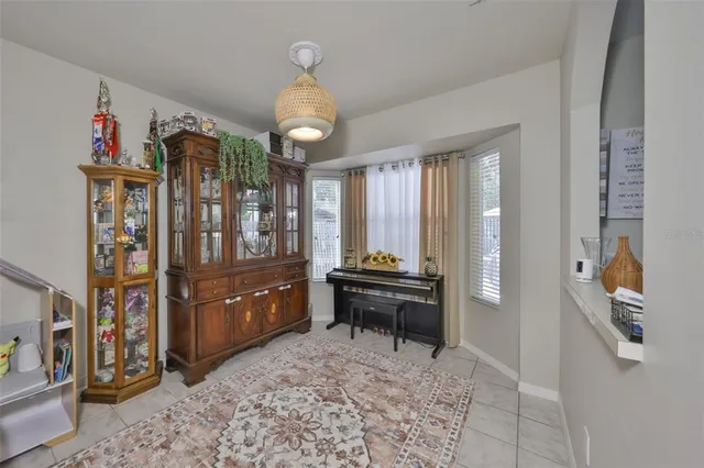 a kitchen with stainless steel appliances granite countertop a stove sink and cabinets