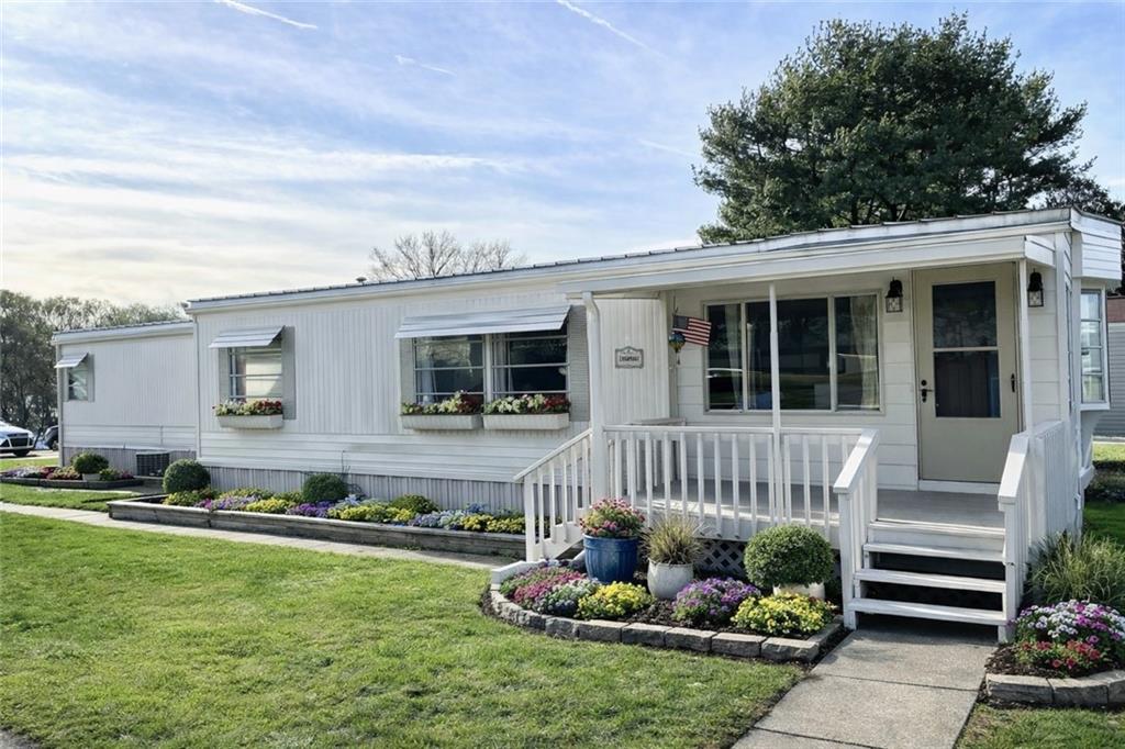 a house view with a garden space