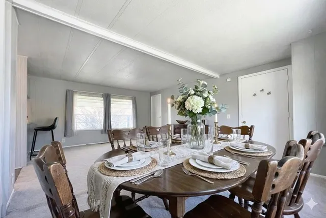 a view of a dining room with furniture
