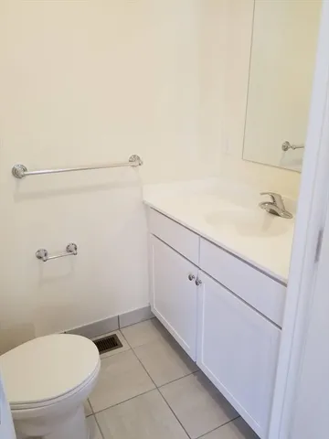 a bathroom with a toilet and a sink