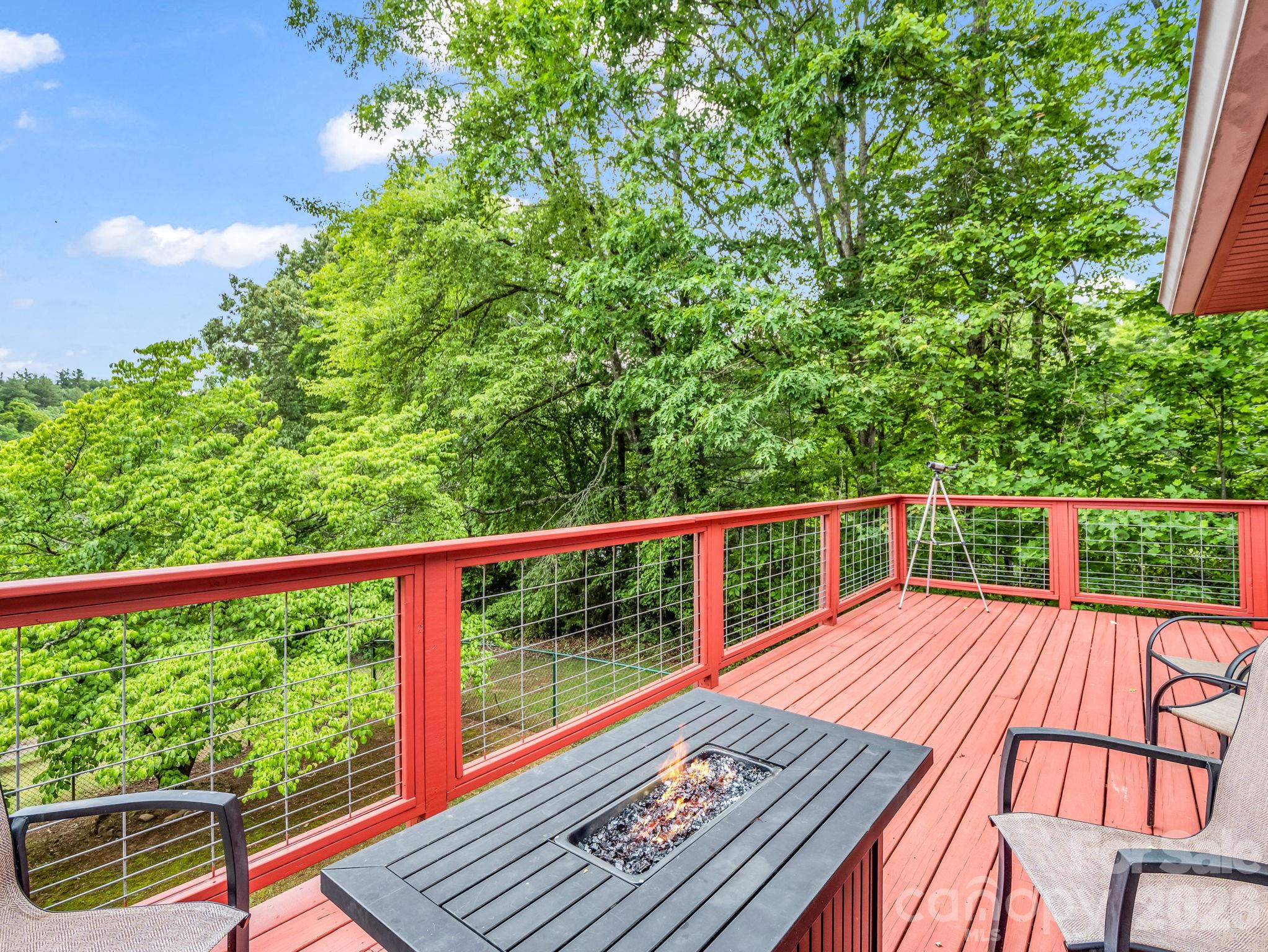 656 Cashiers Valley Road Brevard, NC 28712 - Photo 31 of 37 a view of balcony with wooden floor and fence