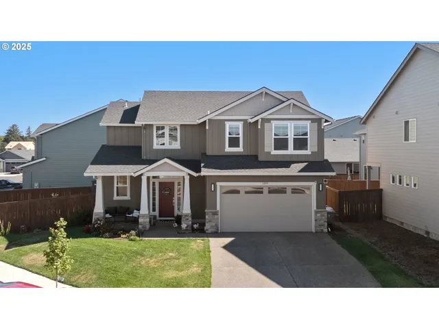 a house view with a garden space