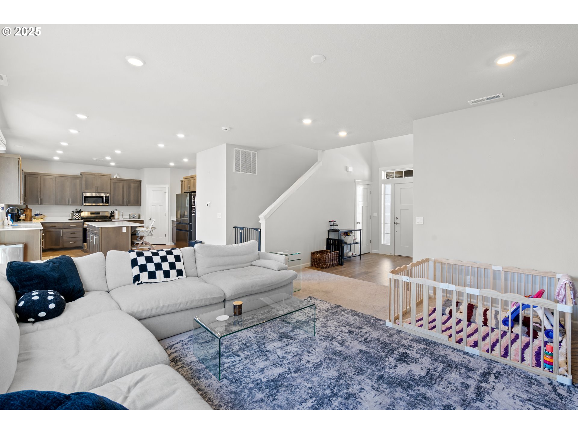6099 Savannah Street Southeast Albany, OR 97322 - Photo 11 of 32 a living room with furniture kitchen view and a couch