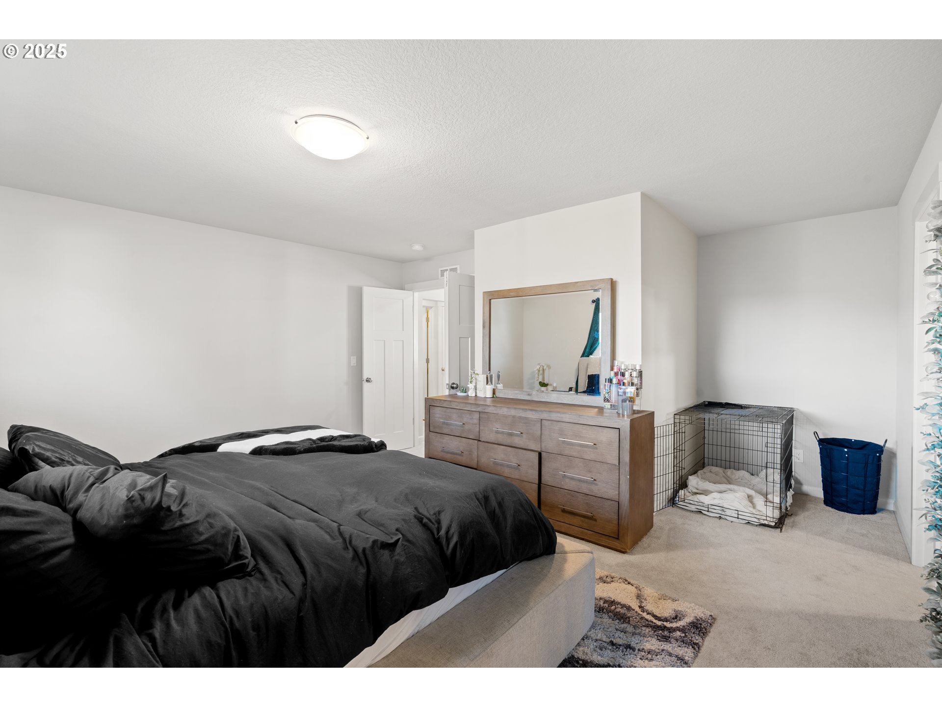 6099 Savannah Street Southeast Albany, OR 97322 - Photo 20 of 32 a bedroom with a bed and a table in it