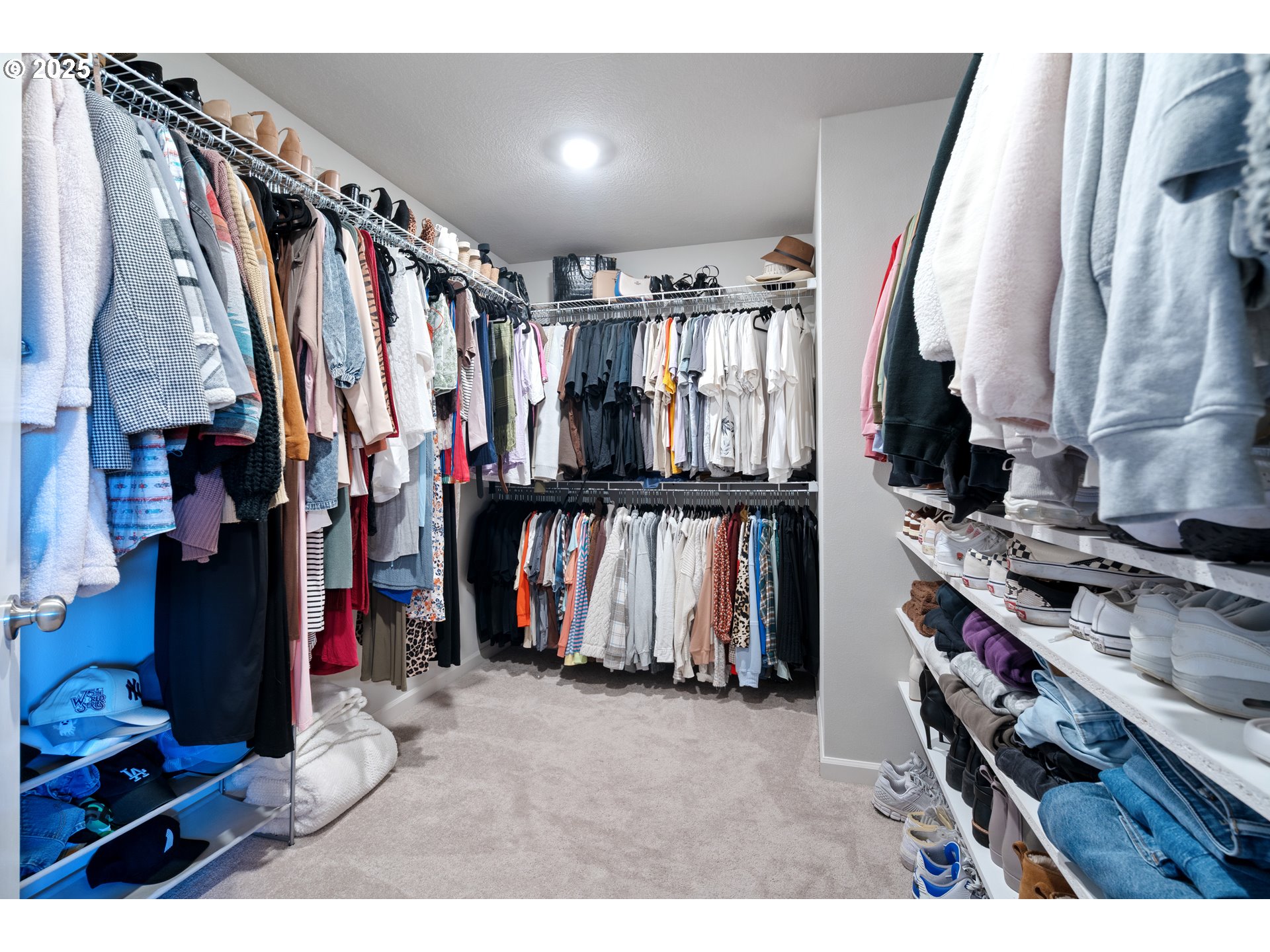 6099 Savannah Street Southeast Albany, OR 97322 - Photo 22 of 32 a view of walk in closet with clothes and shoes