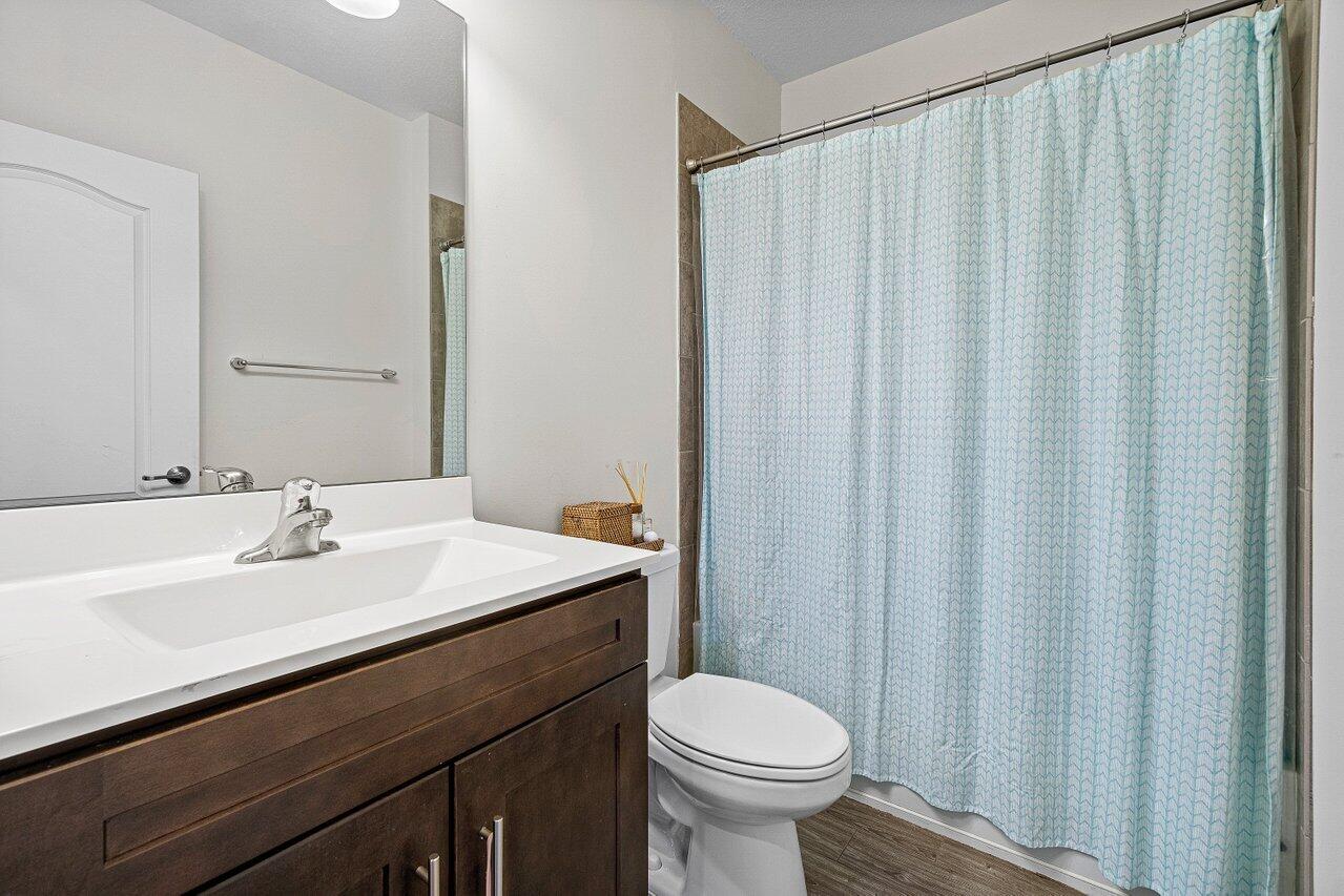 12949 Anthorne Lane Boynton Beach, FL 33436 - Photo 16 of 37 a bathroom with a sink and a mirror