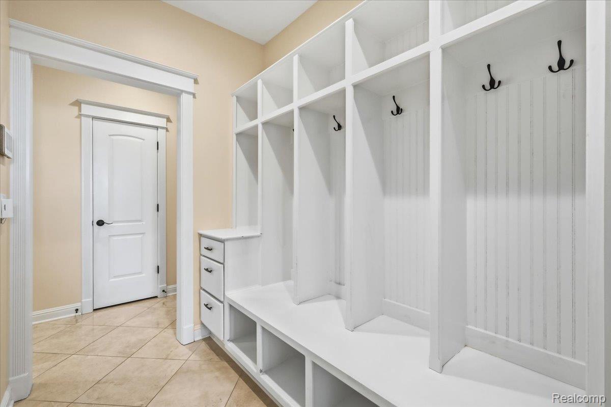 35339 West 13 Mile Road Farmington, MI 48331 - Photo 39 of 72 Mudroom with light tile patterned floors and baseboards