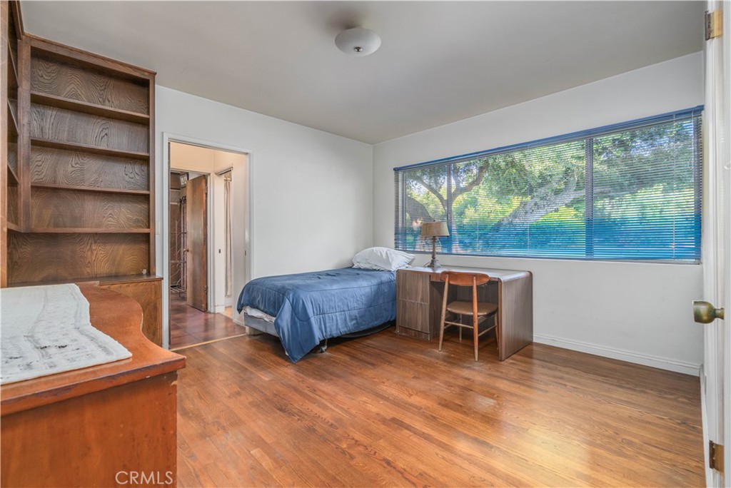 920 South Spring Meadow Drive West Covina, CA 91791 - Photo 14 of 48 a bedroom with a bed and a large window