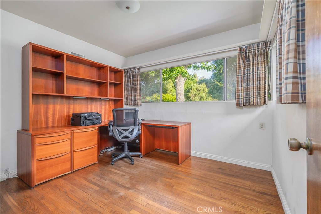 920 South Spring Meadow Drive West Covina, CA 91791 - Photo 18 of 48 a view of room with workspace and windows
