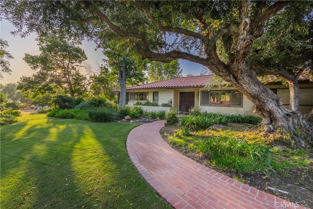 920 South Spring Meadow Drive West Covina, CA 91791 - Photo 23 of 48 a view of a house with a yard