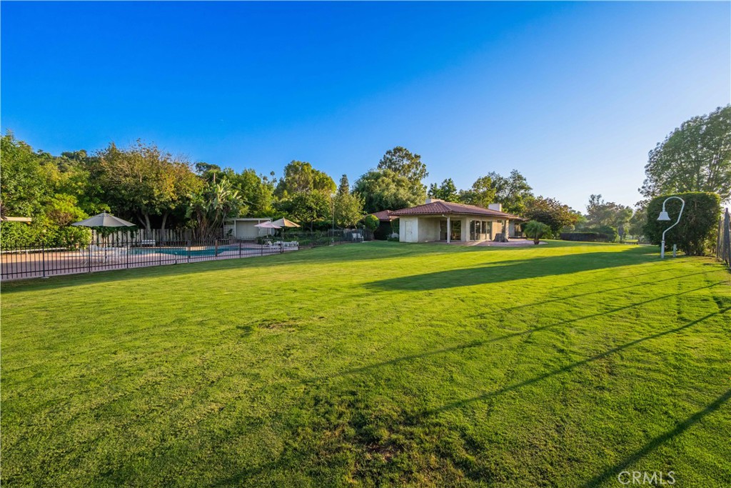 920 South Spring Meadow Drive West Covina, CA 91791 - Photo 24 of 48 a view of a swimming pool with an ocean view