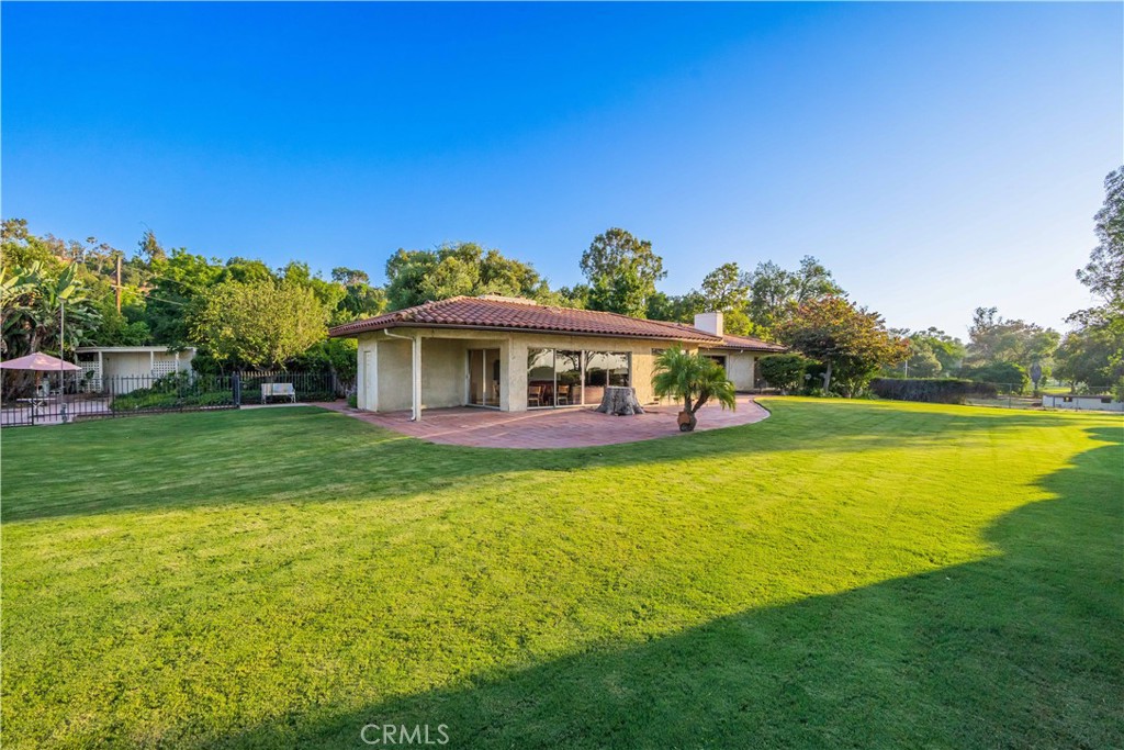 920 South Spring Meadow Drive West Covina, CA 91791 - Photo 35 of 48 a front view of a house with garden
