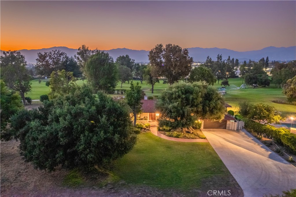 920 South Spring Meadow Drive West Covina, CA 91791 - Photo 4 of 48 an aerial view of a house with a garden and a lake view