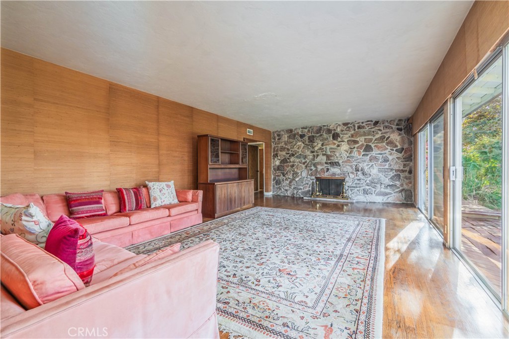 920 South Spring Meadow Drive West Covina, CA 91791 - Photo 8 of 48 a living room with furniture and a fireplace