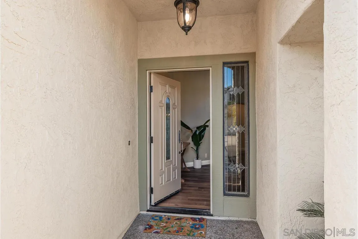 9160 Paseo Cresta Santee, CA 92071 - Photo 2 of 42 a view of a hallway with a elevator