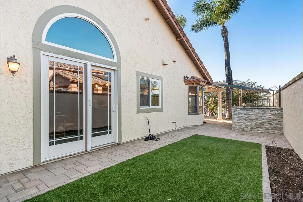 9160 Paseo Cresta Santee, CA 92071 - Photo 31 of 42 a view of an house with backyard porch and entertaining space