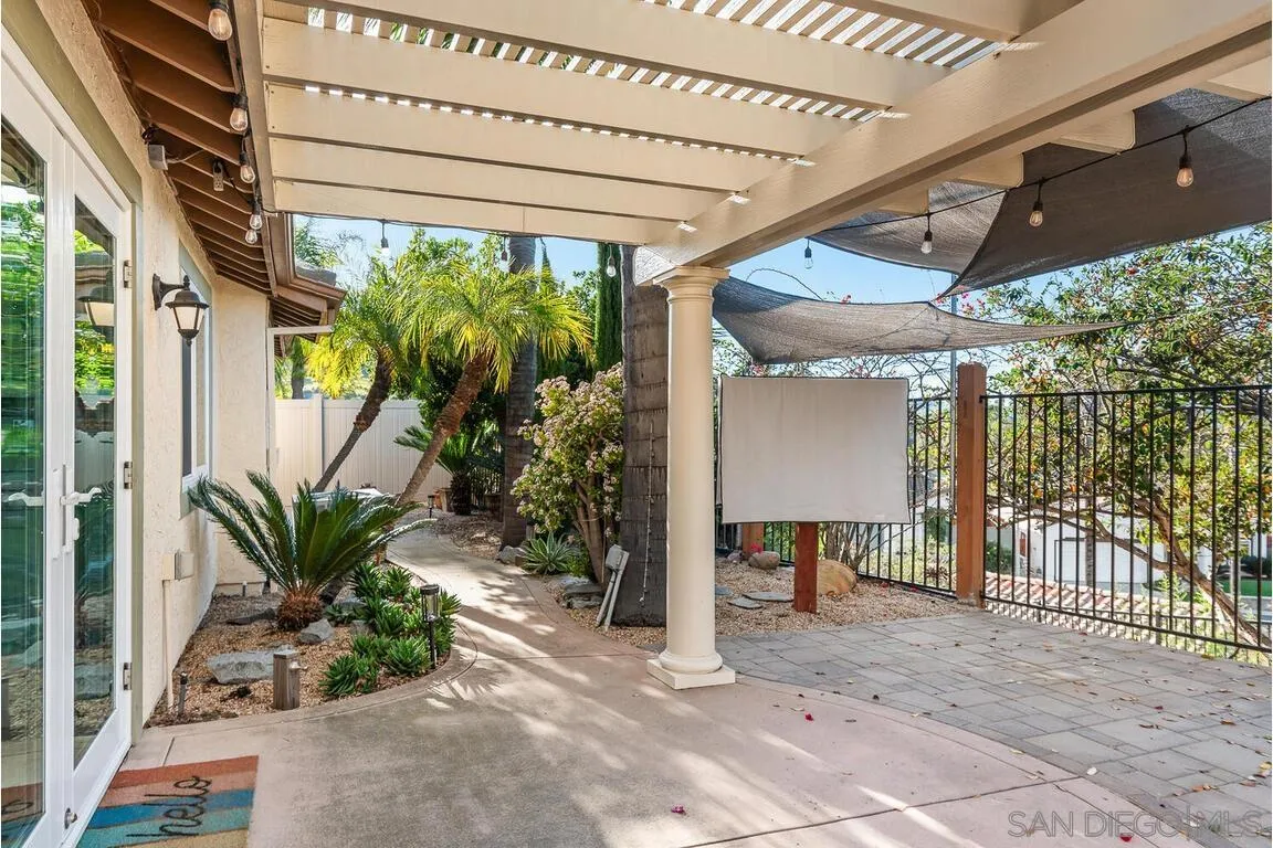 9160 Paseo Cresta Santee, CA 92071 - Photo 34 of 42 a view of a porch with chairs and potted plants