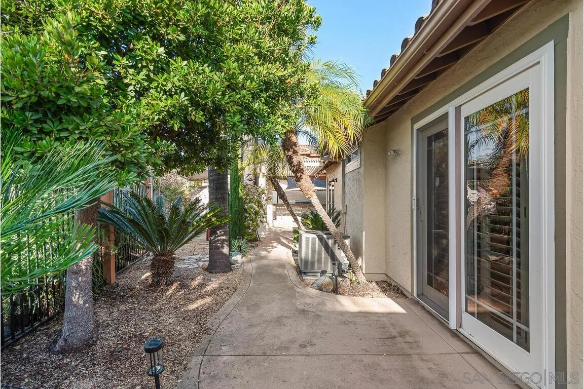 9160 Paseo Cresta Santee, CA 92071 - Photo 38 of 42 a view of a house with a tree beside it