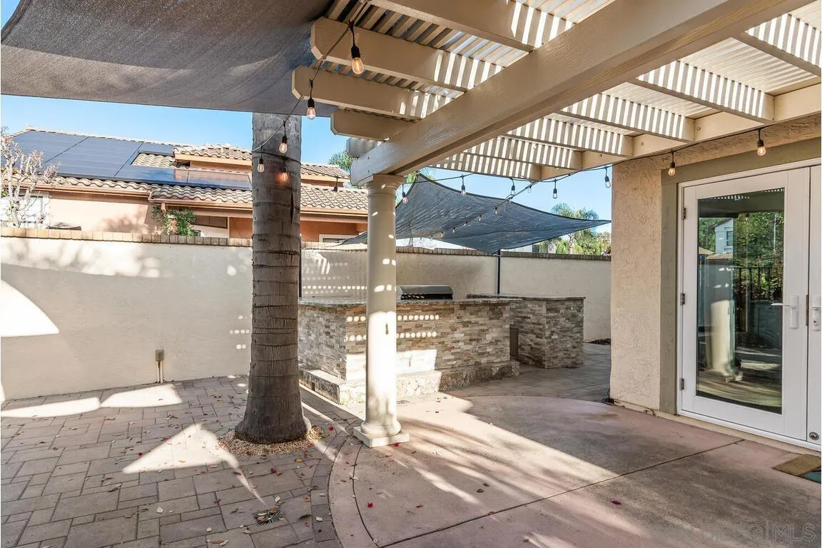 9160 Paseo Cresta Santee, CA 92071 - Photo 39 of 42 a view of a porch with a table and chairs