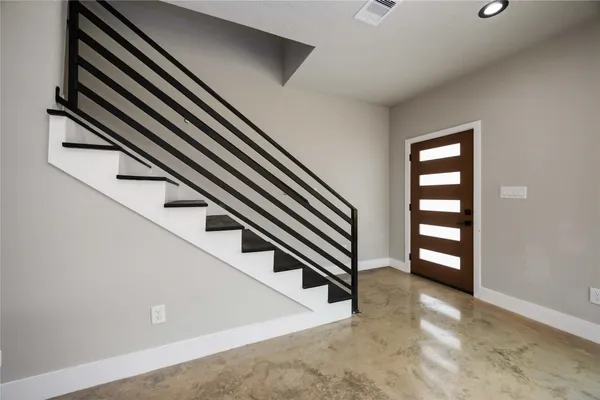 a view of an entryway with staircase