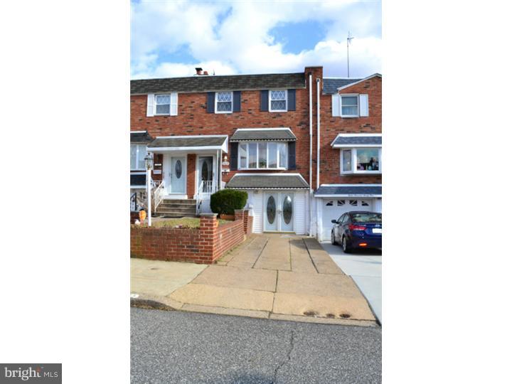 12023 Tyrone Road Philadelphia, PA 19154 - Photo 1 of 16 a view of a building with many windows
