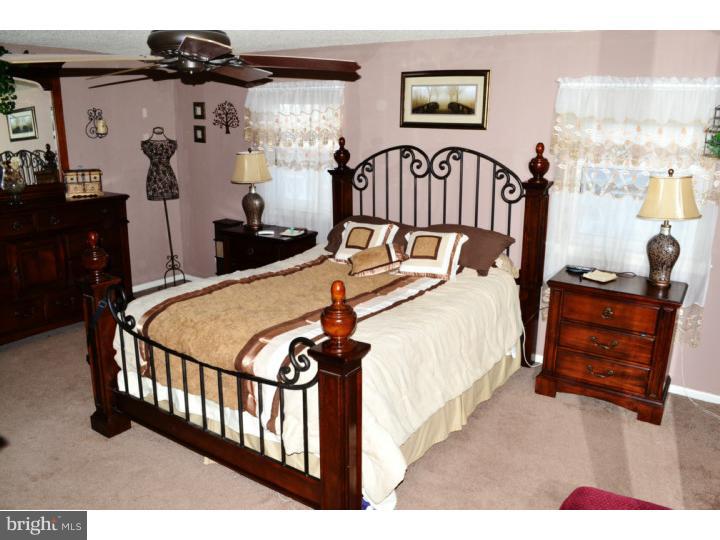 12023 Tyrone Road Philadelphia, PA 19154 - Photo 12 of 16 a bed room with furniture and decor
