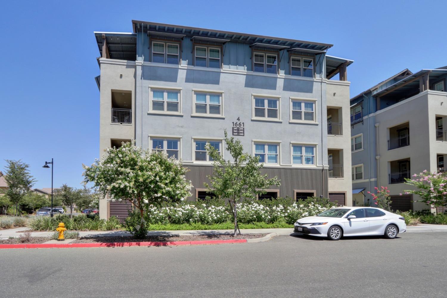 a view of street with parked cars