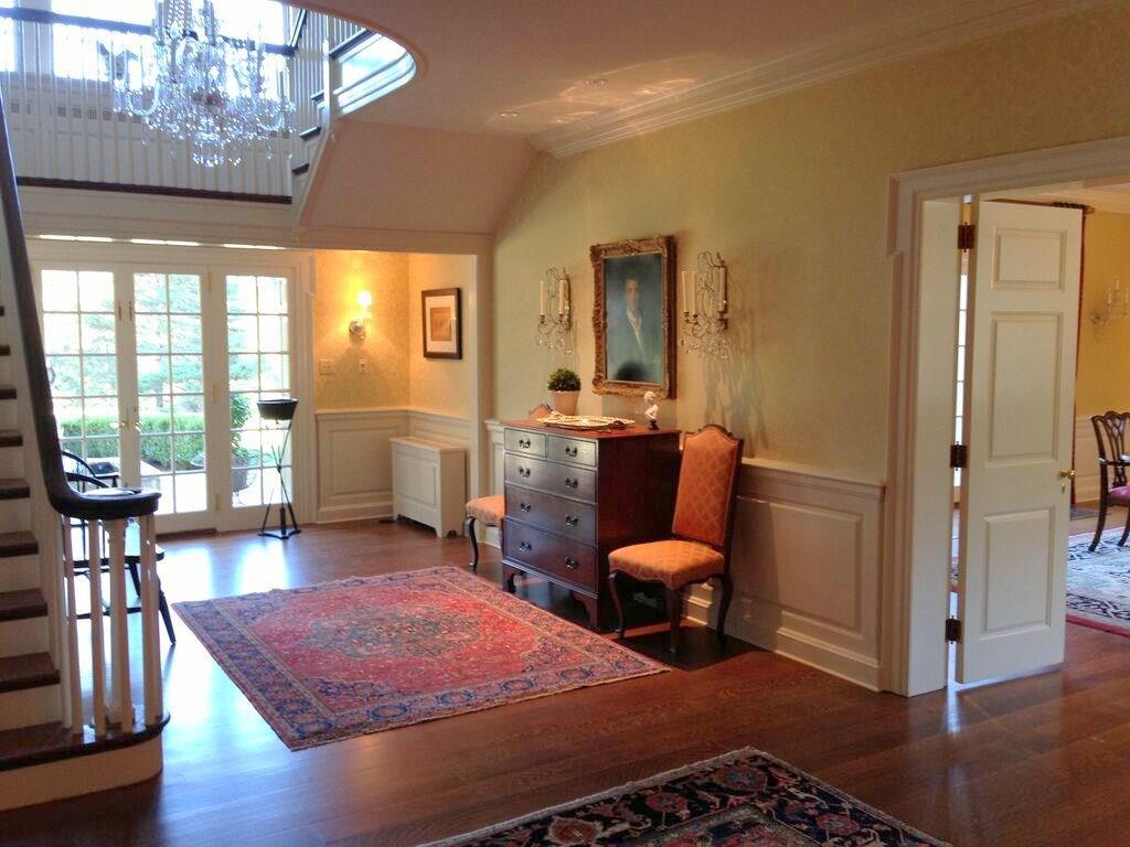 899 Persimmon Road Sewickley Heights, PA 15143 - Photo 4 of 25 Another view of the entry hall, showing wainscoating and French doors to the large rear patio