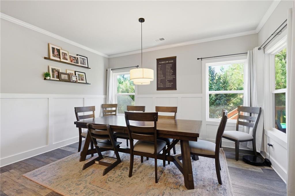 47 Violet Lane Dallas, GA 30132 - Photo 9 of 27 a view of a dining room with furniture window and outside view