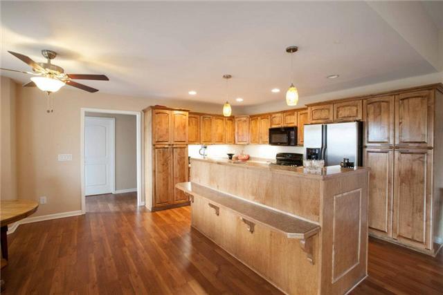 Kitchen also has wheelchair height breakfast bar. 
